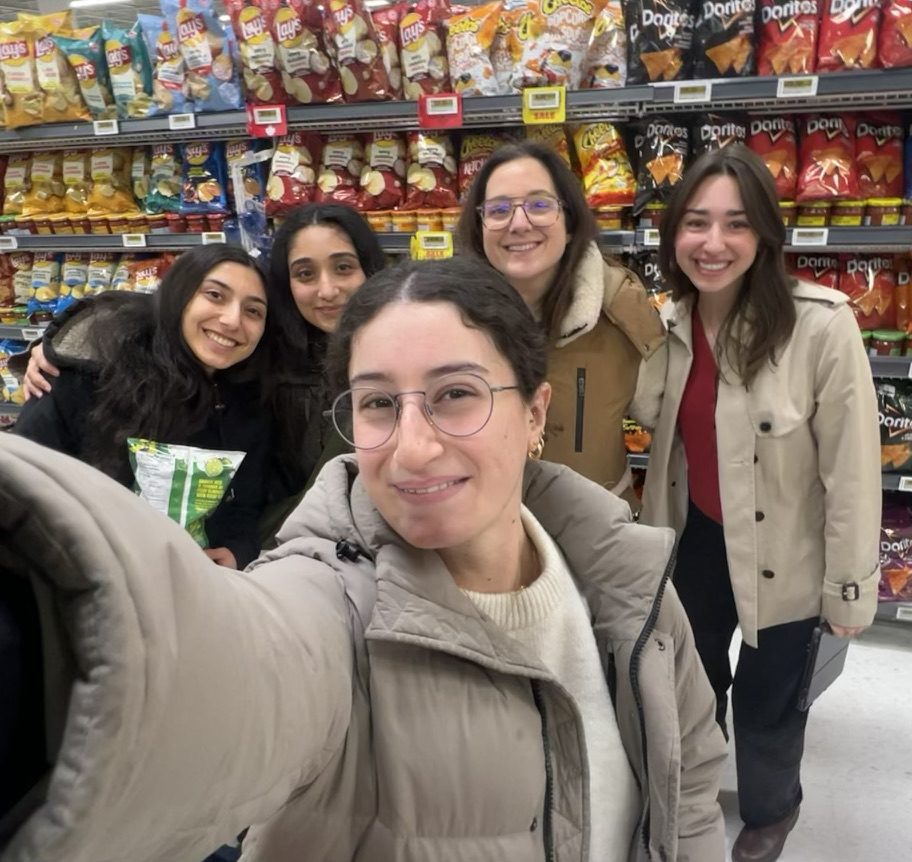 The team in a grocery store snack aisle